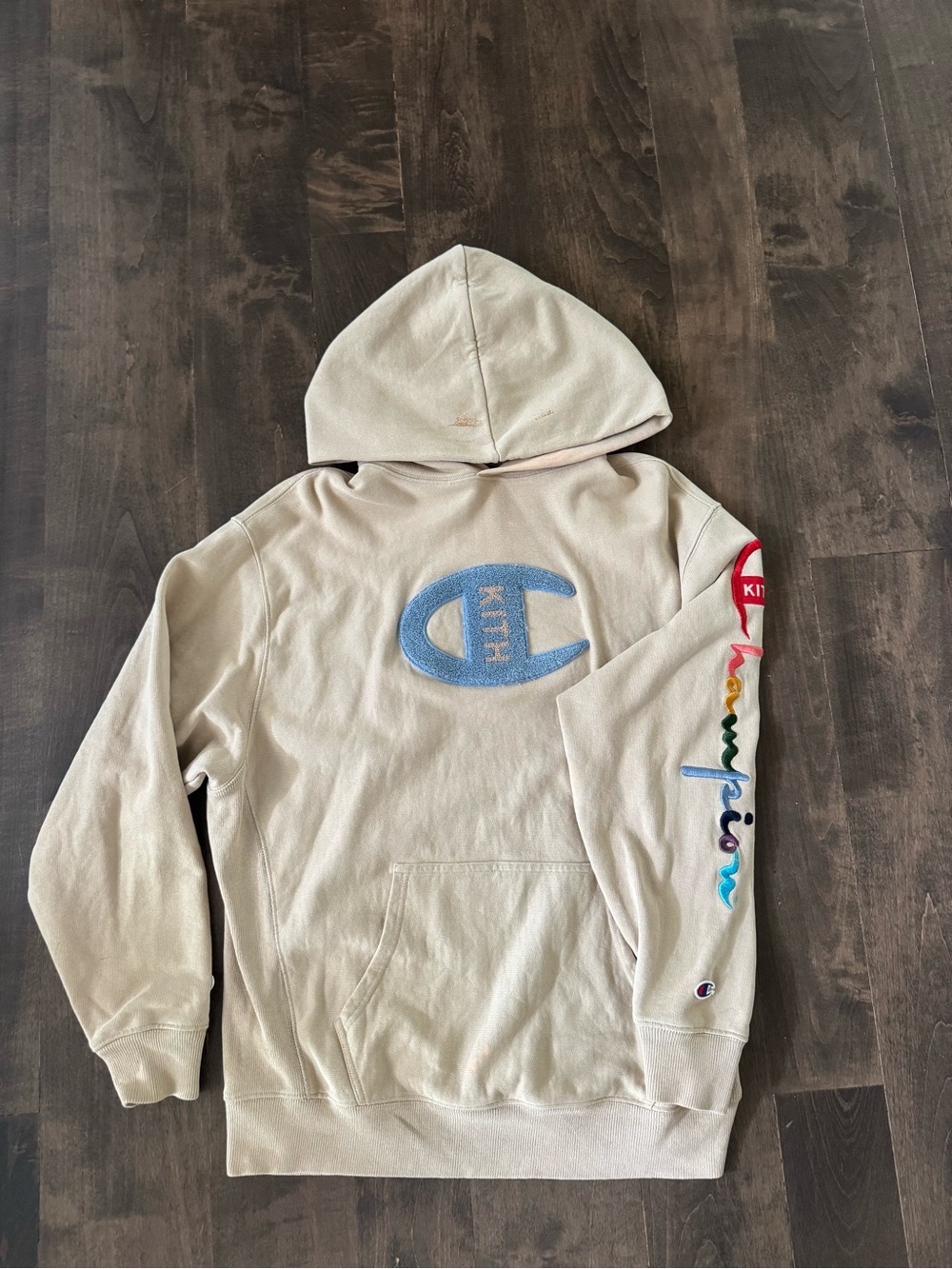Kith x Champion Cream Crewneck Hoodie with Blue Logo